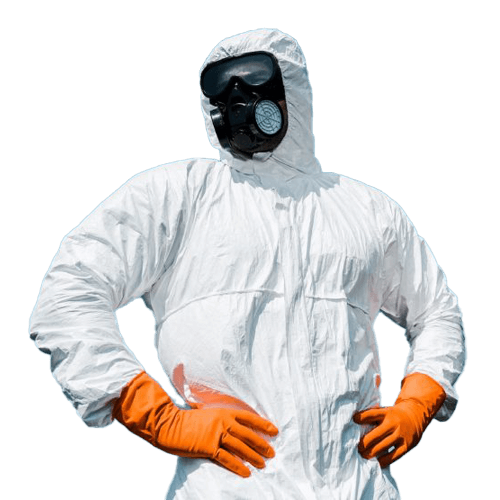 A man wearing a white protective suit and orange gloves, standing in a laboratory setting.